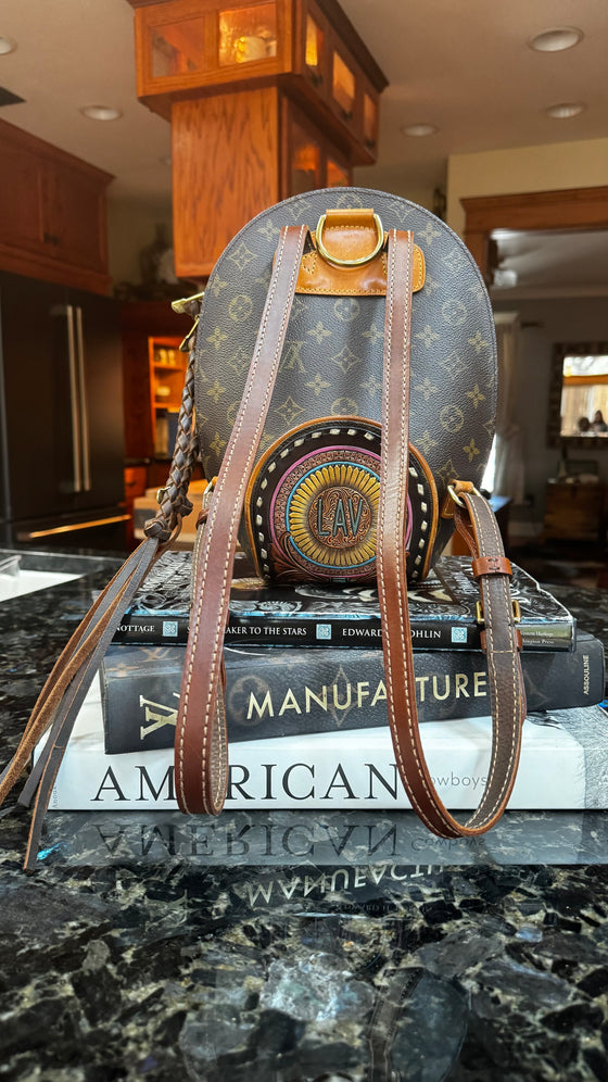 LAV Original Ellipse Backpack Chocolate Zipper Pulls with Western Skies Tooled Patch