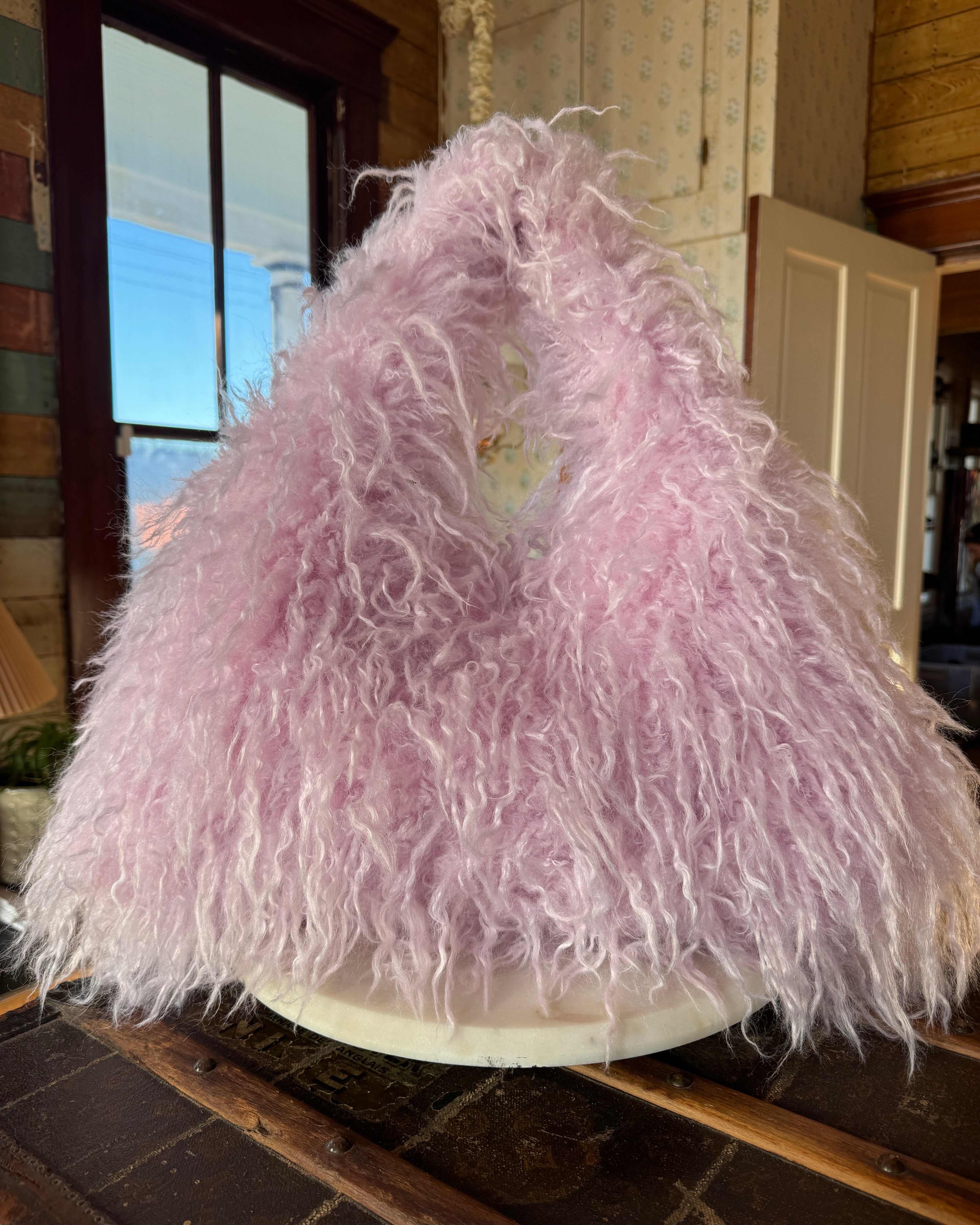 Pink Gucci Softbit Shearling handbag with a gold clasp on a wooden surface with Leather finge. Leather and Vodka, LAV