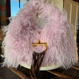 Pink Gucci Softbit Shearling handbag with a gold clasp on a wooden surface with Leather finge. Leather and Vodka, LAV
