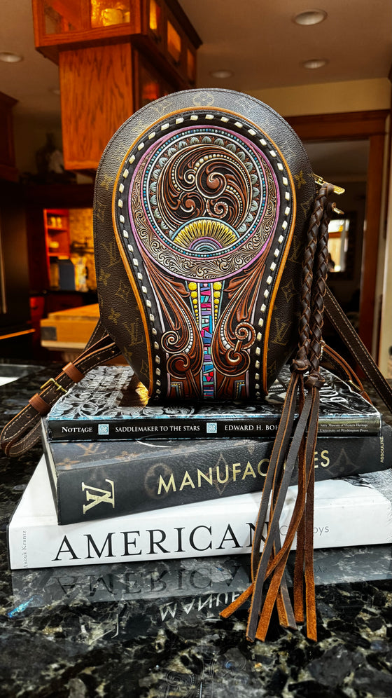 LAV Original Ellipse Backpack Chocolate Zipper Pulls with Western Skies Tooled Patch